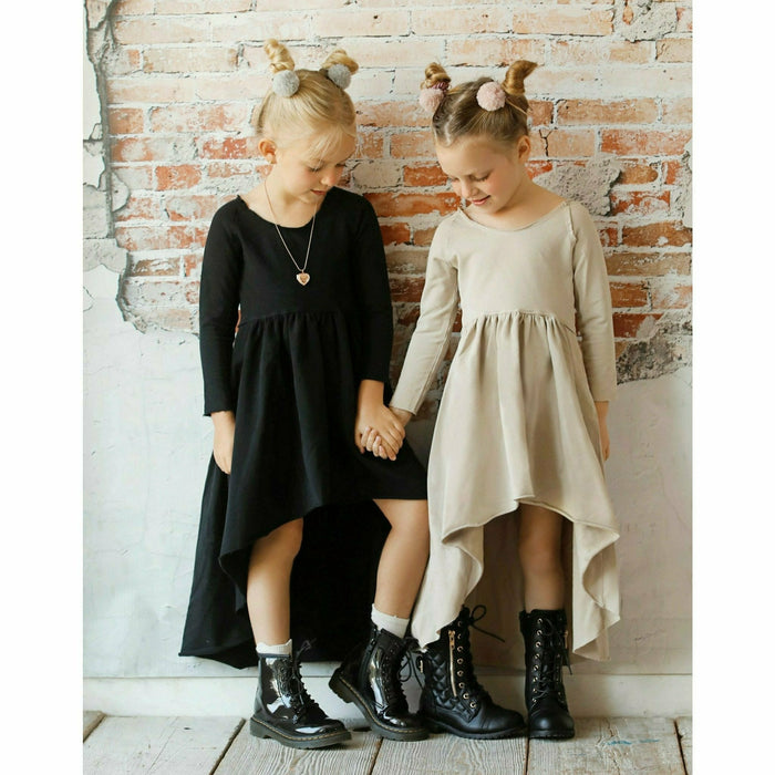 Black organic Giselle dress with long sleeves by Be Mi Los Angeles, featuring a flowing, elegant design.