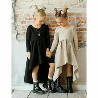 Be Mi Los Angeles Organic Giselle Dress with long sleeves in tan, featuring a flowy, elegant design for casual or dressy occasions.