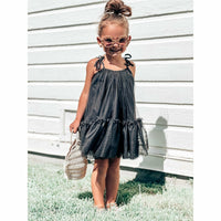 Black Mila dress by Be Mi Los Angeles, stylish sleeveless dress with a fitted silhouette and elegant design.