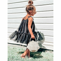 Black Mila Dress by Be Mi Los Angeles, stylish sleeveless dress with a fitted silhouette and elegant design.