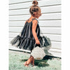 little girl wearing black tutu dress