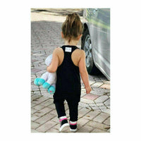 Black romper by Be Mi Los Angeles featuring a stylish, comfortable design, perfect for casual or semi-formal occasions.