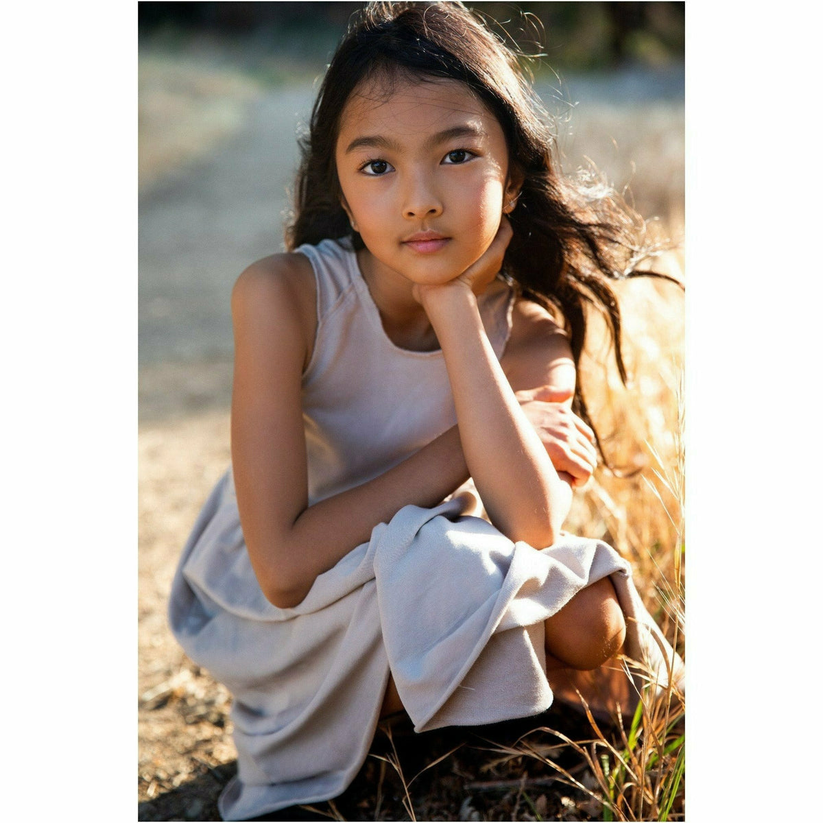 Organic Giselle Dress in tan by Be Mi Los Angeles, showcasing a flowy, stylish dress with natural fabric and elegant design.