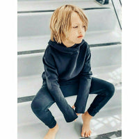 Black organic Benji kids’ hoodie by Be Mi Los Angeles, soft sweatshirt for children with cozy fabric and casual style.