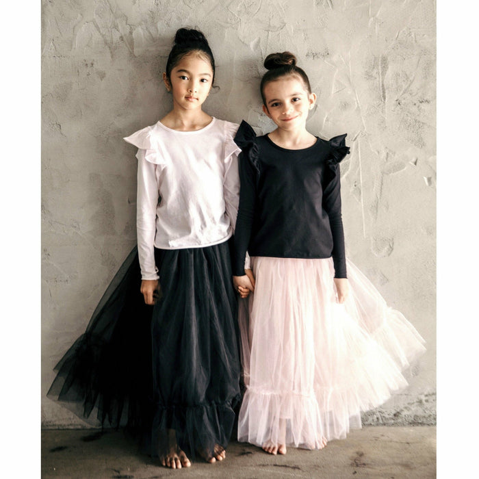 Black ballerina skirt by Be Mi Los Angeles, showcasing lightweight fabric and classic design perfect for dance or casual wear.