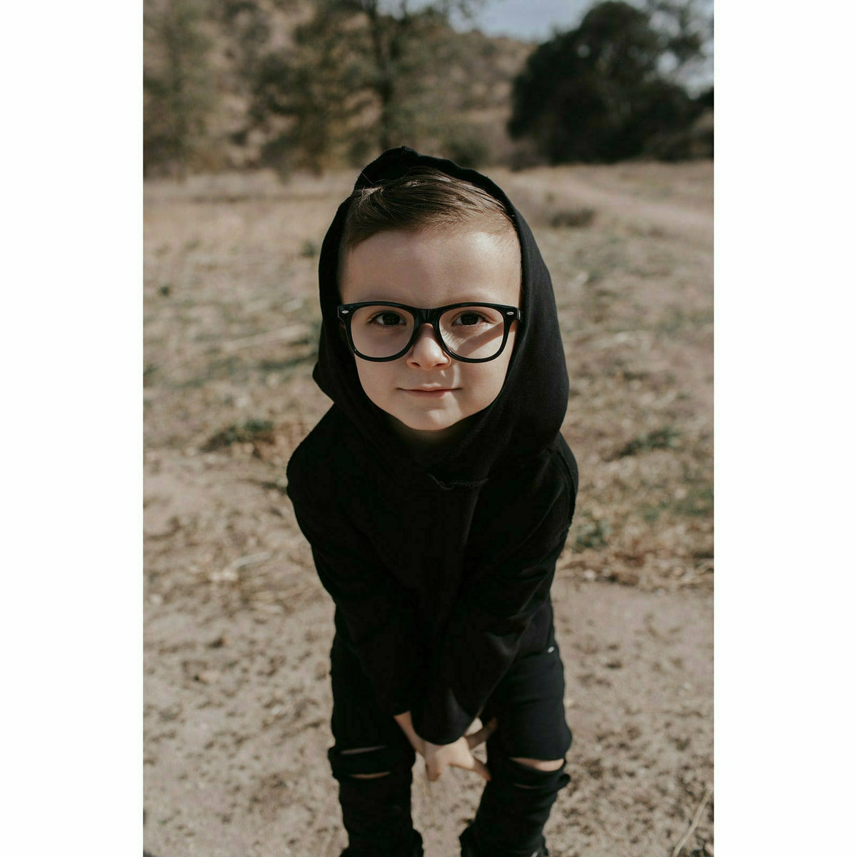 Organic Benji Kids’ Hoodie in black, Be Mi Los Angeles sweatshirt for children, with a cozy, casual fit and soft fabric.