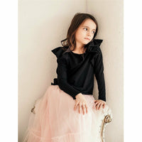 Be Mi Los Angeles Natalia Ruffle Top, stylish women's top with ruffle details and feminine design, shown in a close-up image.