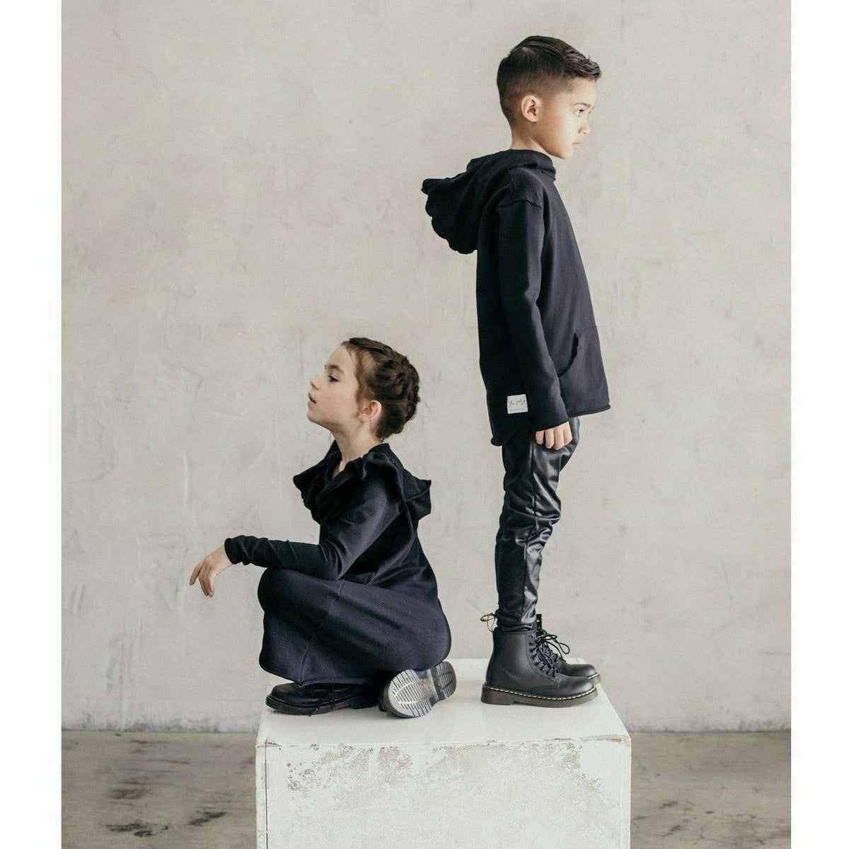 Black organic Benji kids' hoodie by Be Mi Los Angeles, soft sweatshirt with comfortable fit for children.