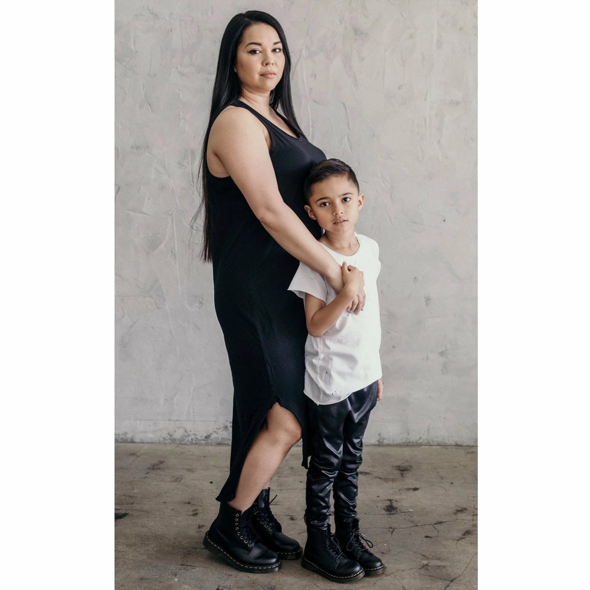 Black Lexi Tank Dress by Be Mi Los Angeles, adult women's dress with a sleek, fitted design, shown on a model.