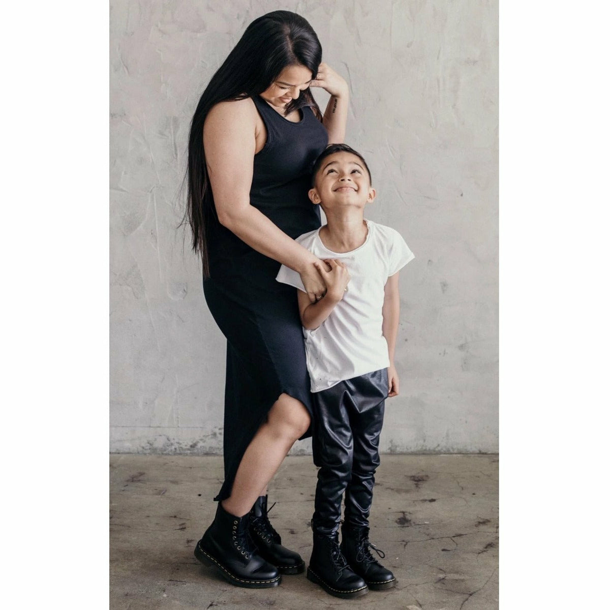 Black Lexi Tank Dress for adults by Be Mi Los Angeles, featuring a sleeveless, casual dress style.
