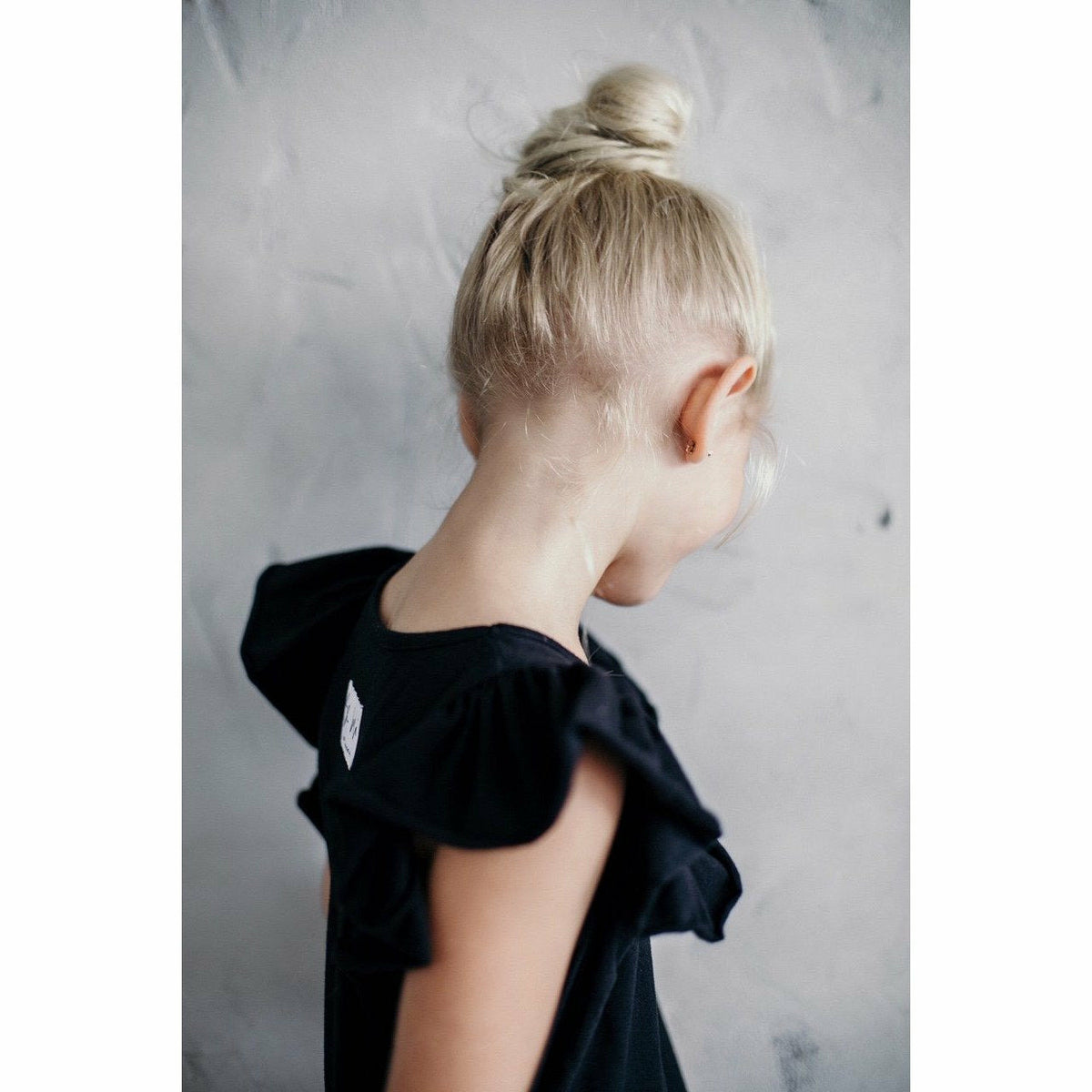 Black Valentina Ruffle Dress by Be Mi Los Angeles, featuring elegant ruffle details and a stylish fit, perfect for special occasions.