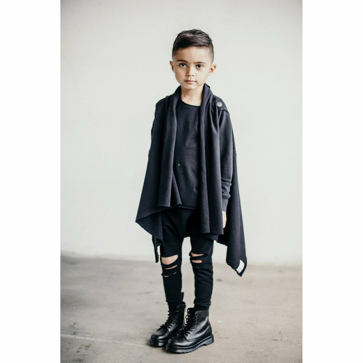 Organic Malibu Joggers by Be Mi Los Angeles in distressed black, featuring a relaxed fit and casual style.
