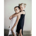 Black Lexi Tank Dress by Be Mi Los Angeles, sleeveless casual dress with a relaxed fit, displayed on a hanger.