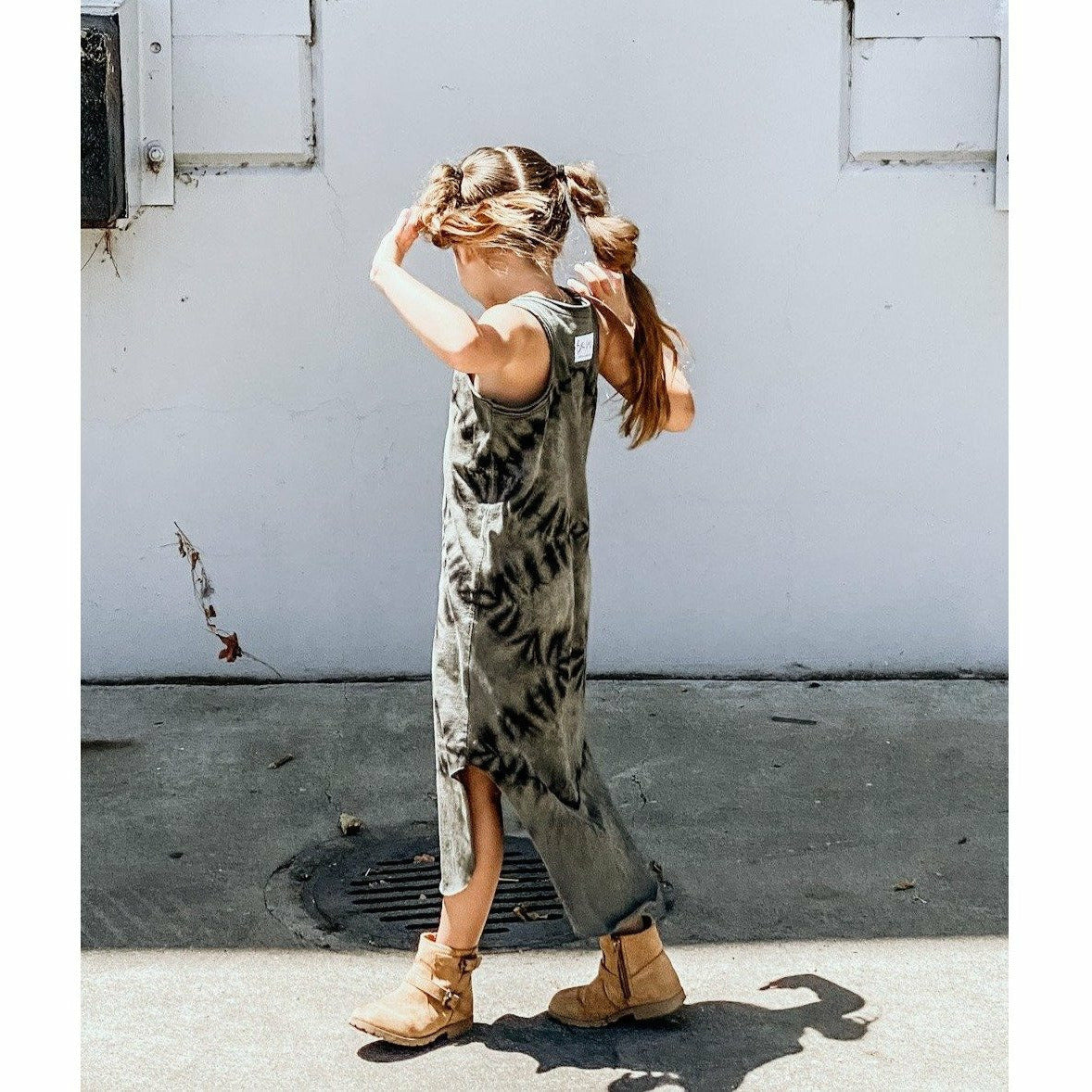Be Mi Los Angeles Lexi Tank Dress in zebra print, dark color, sleeveless design, lightweight fabric, stylish and comfortable for summer wear.