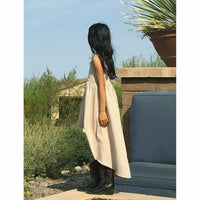 Organic Giselle Dress by Be Mi Los Angeles in tan, featuring a flowing silhouette and natural fabric details.