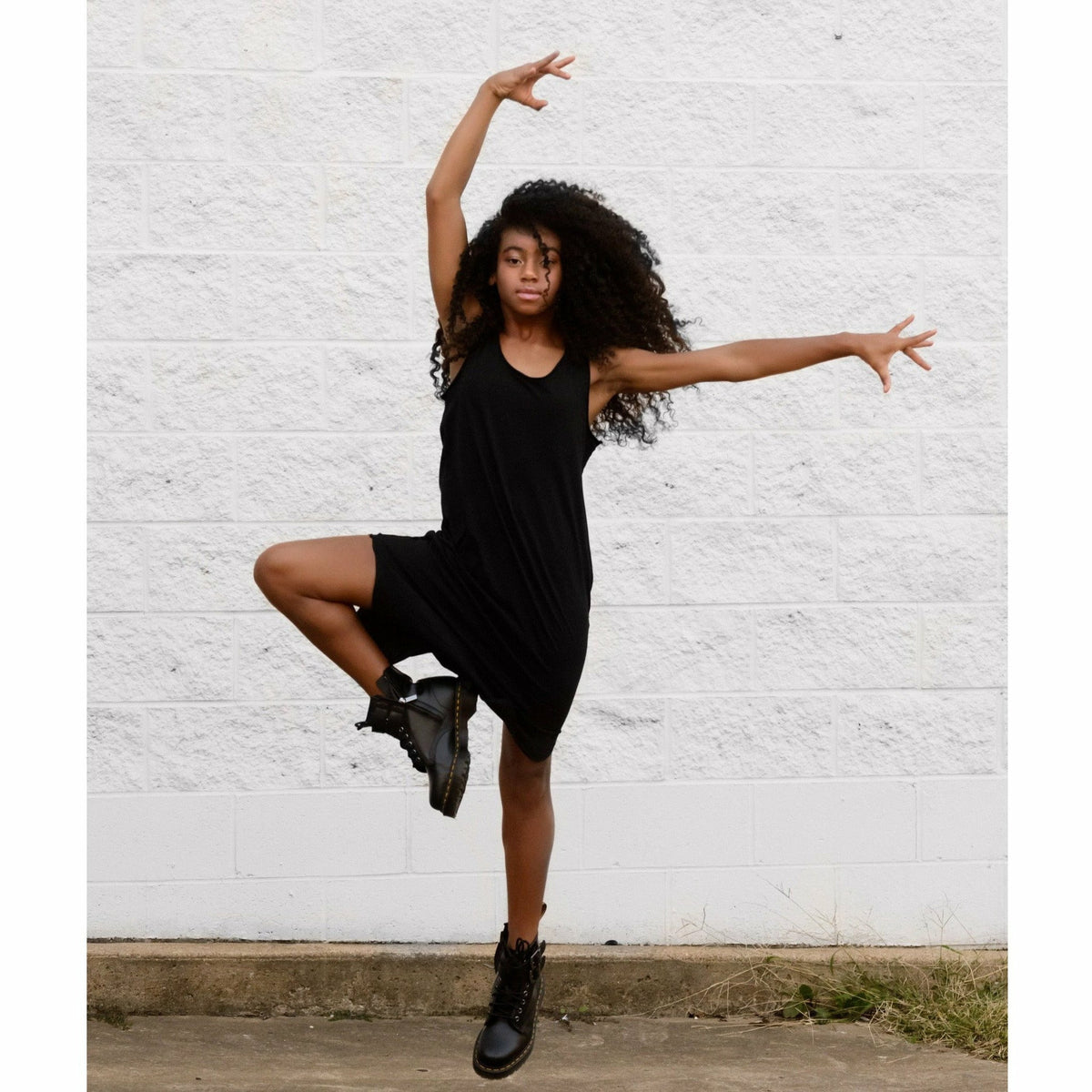 Black Lexi Tank Dress by Be Mi Los Angeles, featuring a sleeveless design and sleek silhouette, perfect for casual or dressy occasions.