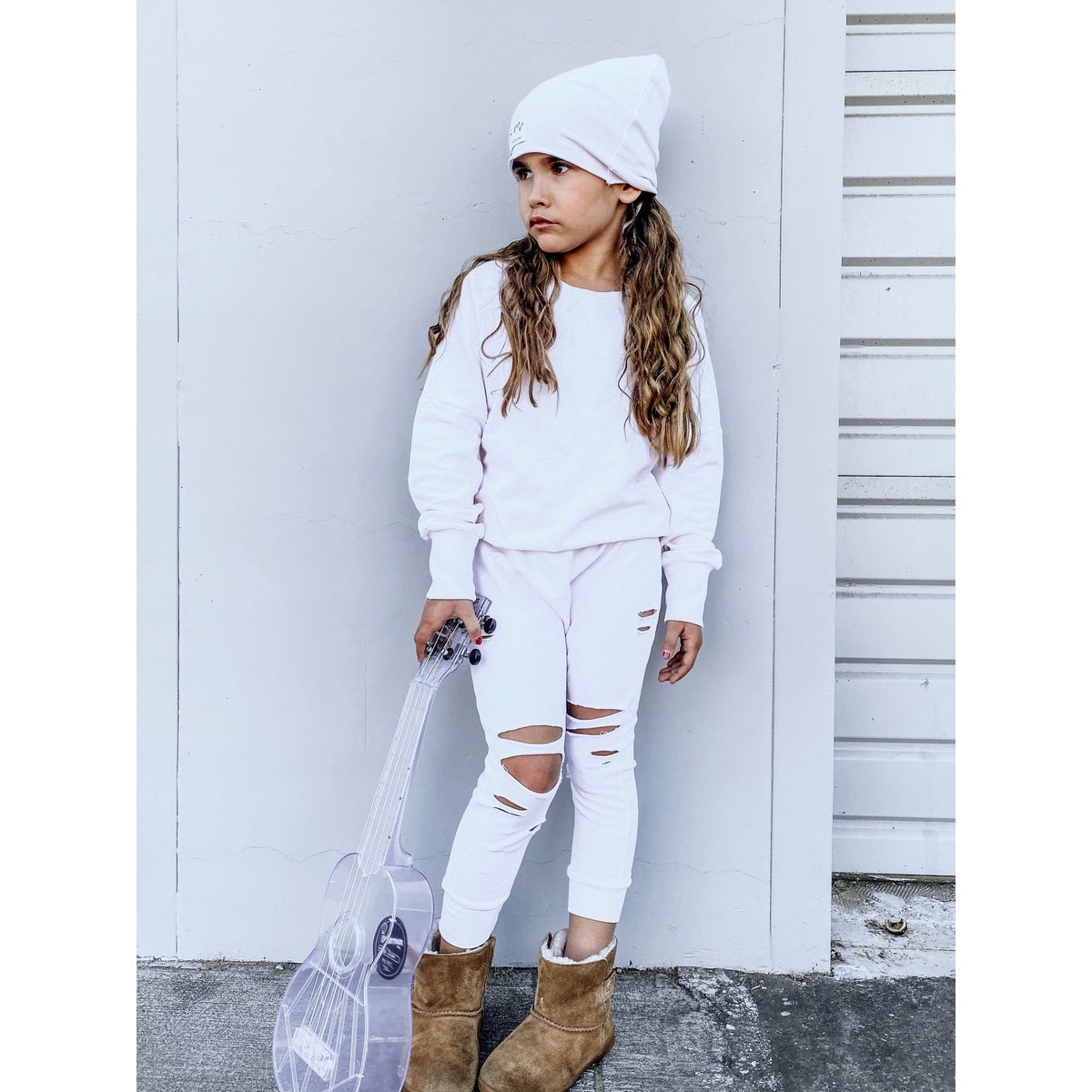 Organic oversized beanie by Be Mi Los Angeles, soft knit fabric in neutral color, styled casually with a relaxed fit.