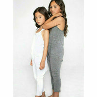 Be Mi Los Angeles white romper displayed on a model, showcasing stylish, casual one-piece jumpsuit with short sleeves and a relaxed fit.