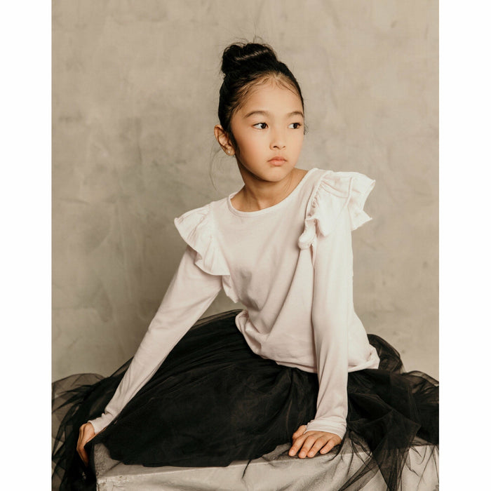 Pink Natalia Ruffle Top by Be Mi Los Angeles, showcasing a stylish, feminine design with ruffled details and a fitted silhouette.