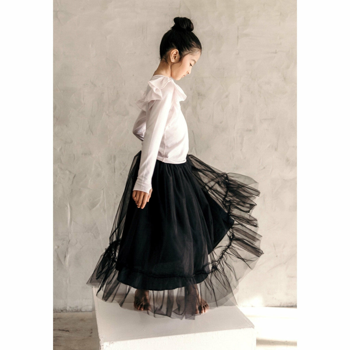 Black Ballerina Skirt by Be Mi Los Angeles, flowing fabric and elegant design, shown in a full view of the skirt.