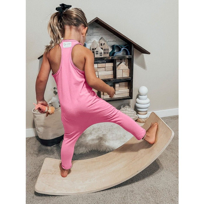 Be Mi Los Angeles romper in bubble gum color, featuring a stylish, comfortable one-piece design with short sleeves and playful details.