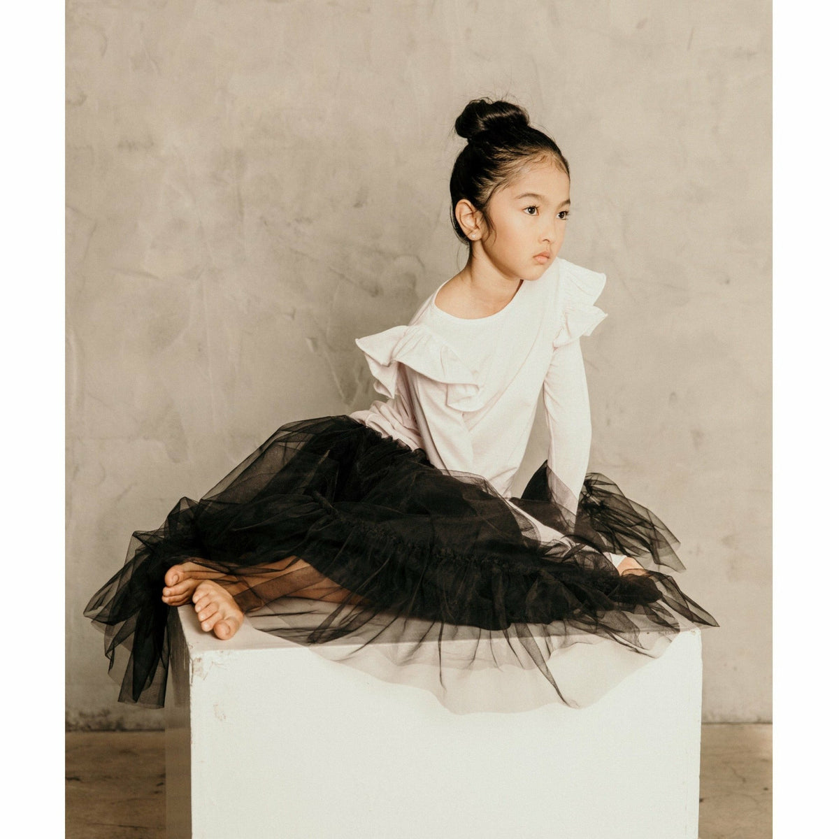 Pink Natalia Ruffle Top by Be Mi Los Angeles, featuring ruffled details and a stylish design, shown on a mannequin.