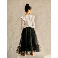 Black ballerina skirt by Be Mi Los Angeles, stylish flowy skirt with a fitted waist and smooth fabric.