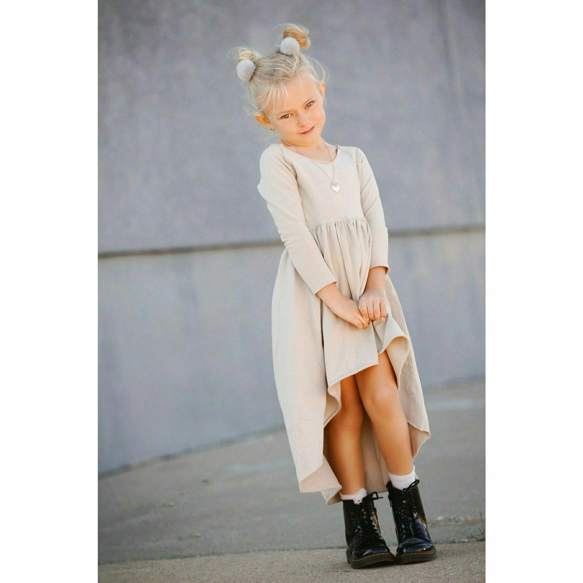 Organic Giselle Dress by Be Mi Los Angeles, long sleeve tan dress with a flowing, elegant design and natural fabric texture.