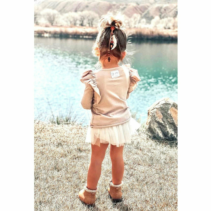 Be Mi Los Angeles Natalia ruffle top in tan, featuring feminine ruffle details and stylish design, perfect for casual or dressy occasions.