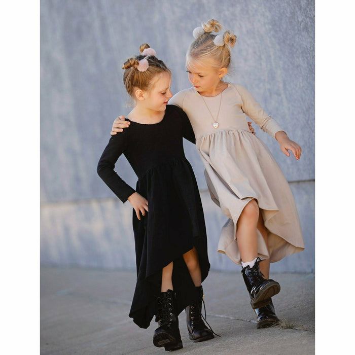 Black long sleeve Organic Giselle Dress by Be Mi Los Angeles, showing flowing fabric and elegant design.