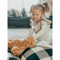 Be Mi Los Angeles Natalia Ruffle Top in tan, featuring elegant ruffle details and a stylish sleeveless design.