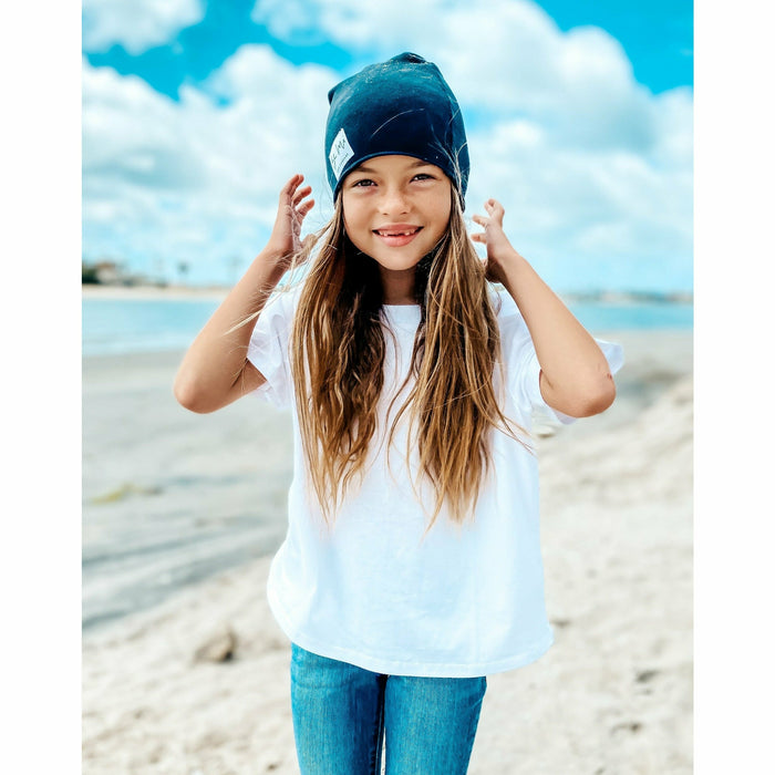 Organic oversized Beanie by Be Mi Los Angeles, soft knit fabric, worn casually on a model's head.