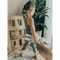 Olive-colored Be Mi Los Angeles romper with short sleeves and relaxed fit, displayed on a hanger against a plain background.