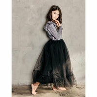 Black Ballerina Skirt by Be Mi Los Angeles featuring soft fabric and a flowing, elegant design.
