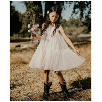 Be Mi Los Angeles Mila pink dress, elegant sleeveless design with a fitted waist, displayed on a mannequin.