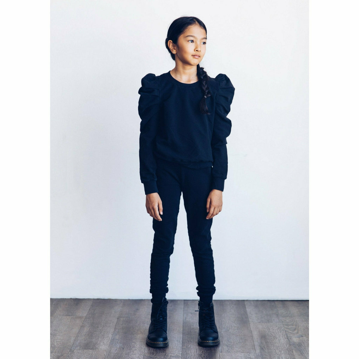 Be Mi Los Angeles Organic Jolie Top, lightweight and stylish blouse with a relaxed fit, displayed on a hanger.
