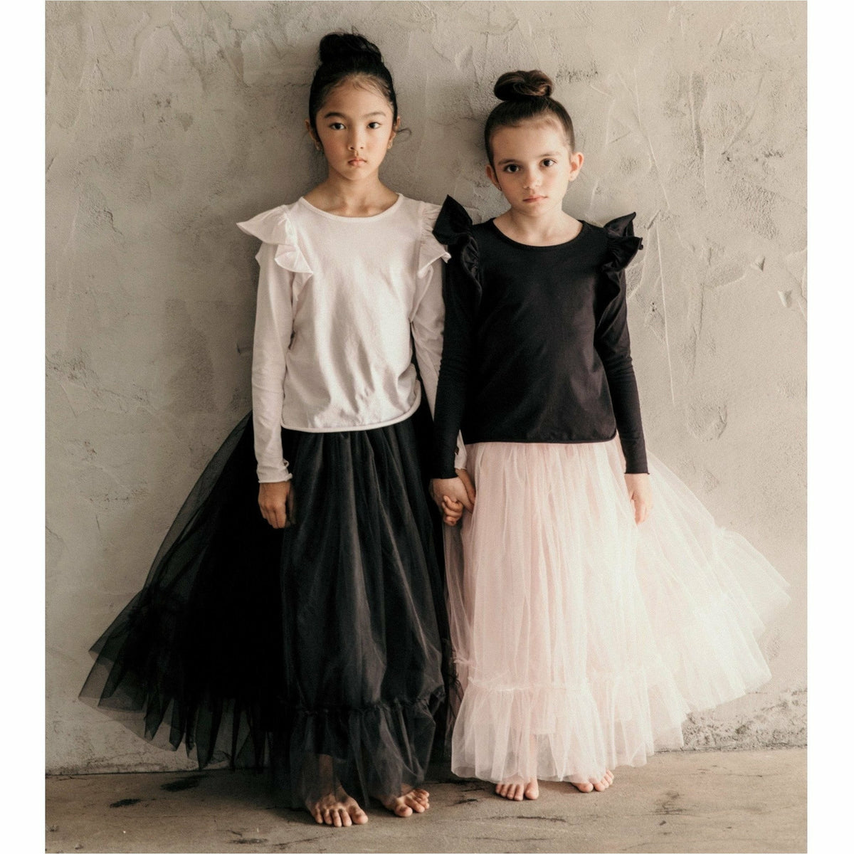 Pink ballerina skirt from Be Mi Los Angeles, featuring a flowing design and soft fabric, perfect for dance or casual wear.