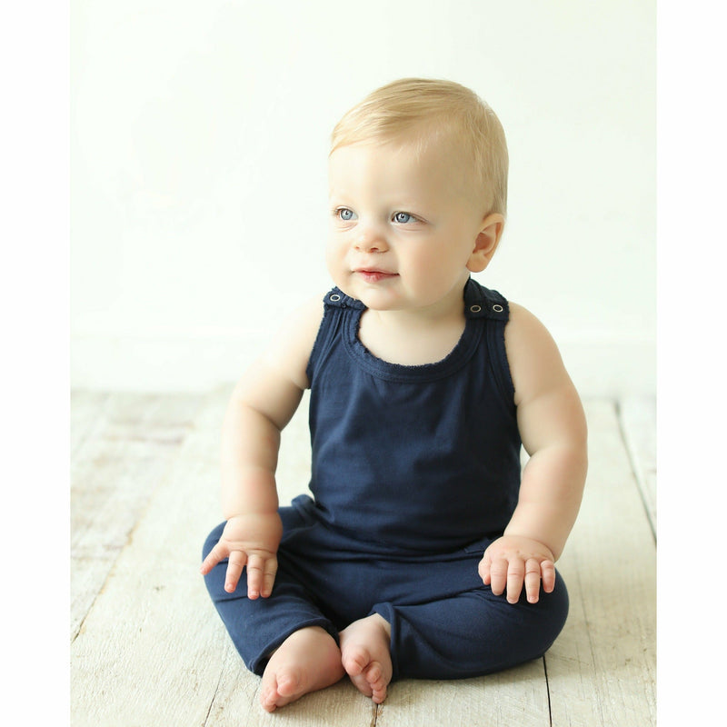baby boy wearing soft and comfortable navy cotton romper