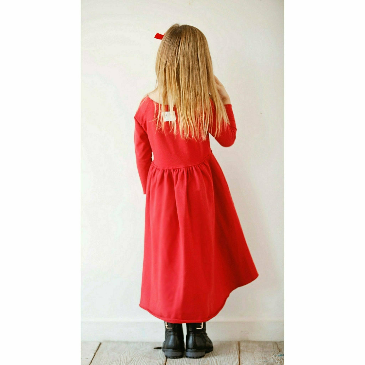 Organic Giselle Dress by Be Mi Los Angeles, long sleeve red dress with a flowing, elegant design suitable for casual or formal wear.