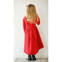 Organic Giselle Dress by Be Mi Los Angeles, long sleeve red dress with a flowing, elegant design suitable for casual or formal wear.