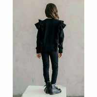 Black organic Victoria ruffle sleeve top by Be Mi Los Angeles, featuring stylish ruffled sleeves and a relaxed fit.