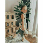 baby girl wearing cotton soft romper in color olive