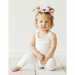 baby girl wearing white soft cotton romper jumper playsuit