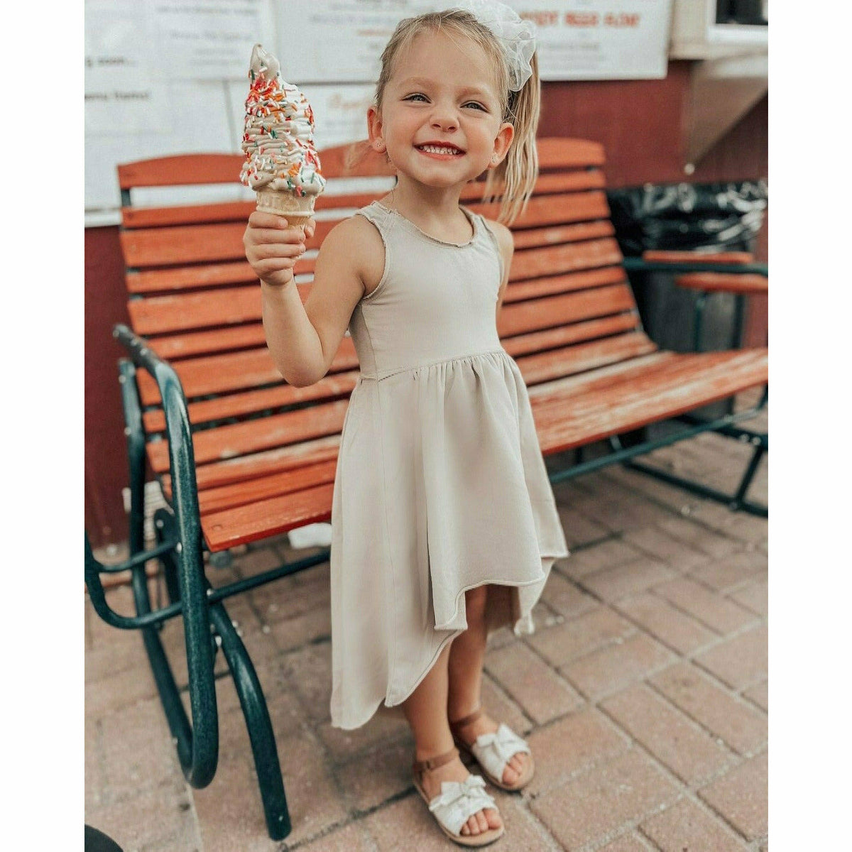 Be Mi Los Angeles Organic Giselle Dress in tan, flowing bohemian-style dress with adjustable straps and lightweight fabric.