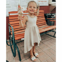 Be Mi Los Angeles Organic Giselle Dress in tan, flowing bohemian-style dress with adjustable straps and lightweight fabric.