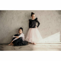 Pink ballerina skirt from Be Mi Los Angeles, flowing fabric and soft waistband, perfect for dance or casual wear.