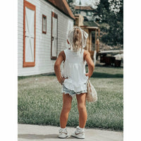 Be Mi Los Angeles Noa Ruffle Tank Top featuring a stylish ruffled design and sleeveless fit, perfect for casual summer wear.