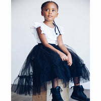 Be Mi Los Angeles Natalia sleeveless ruffle top, showcasing lightweight fabric, ruffled neckline, and stylish sleeveless design.