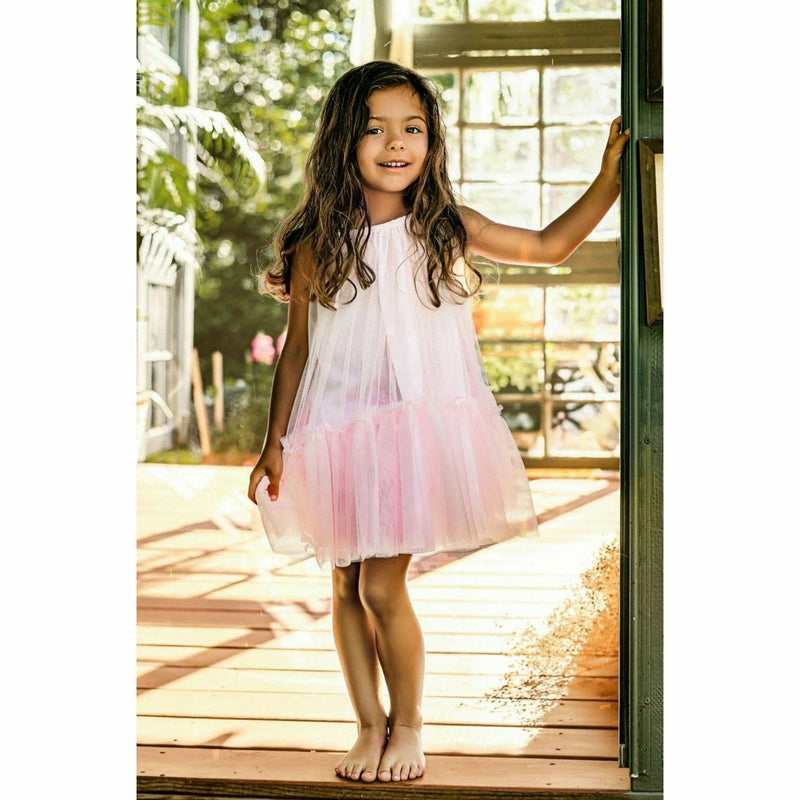 little girl wearing pink tutu dress soft