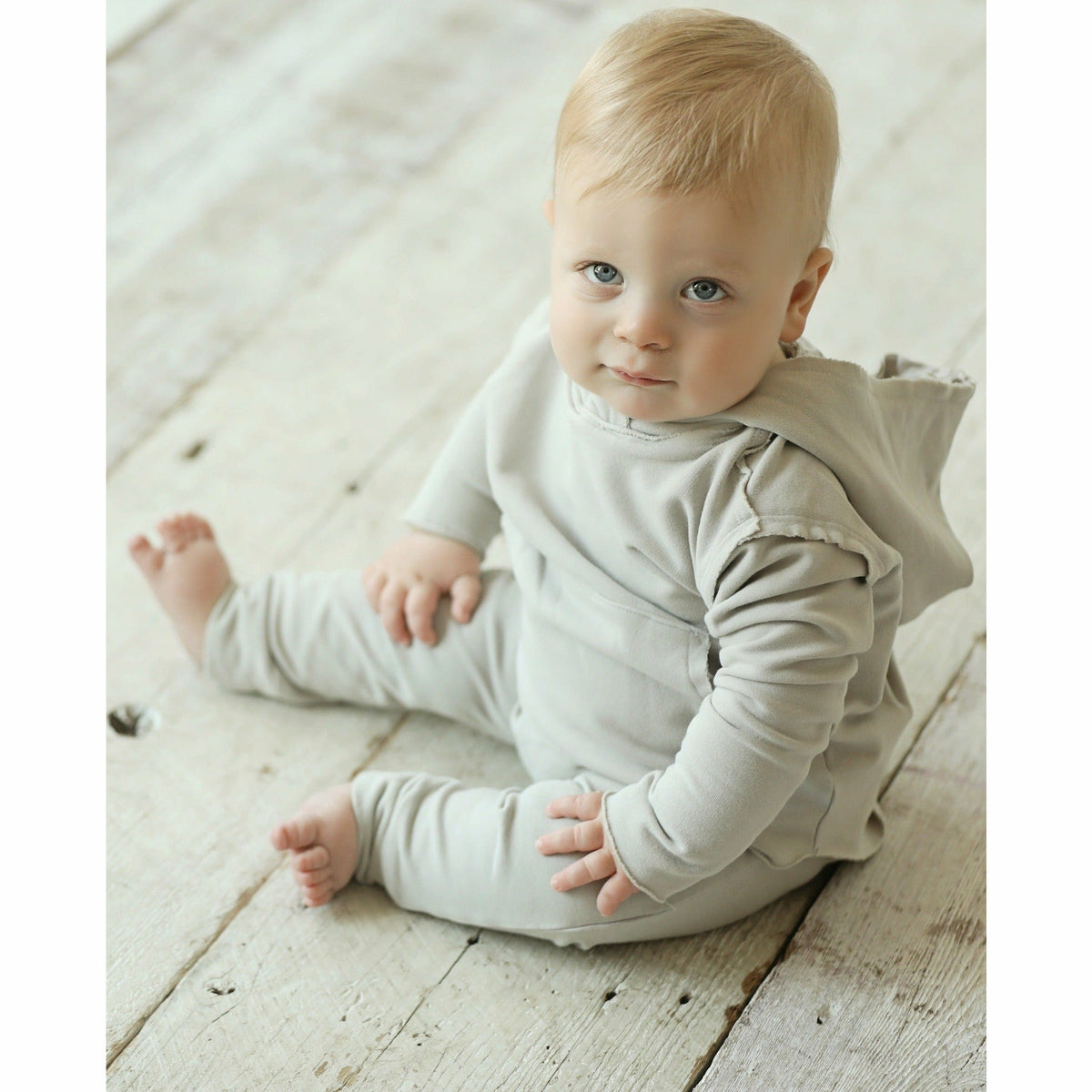Organic Baby Benji Hoodie by Be Mi Los Angeles in stone color, soft and cozy hoodie for infants displayed on a neutral background.